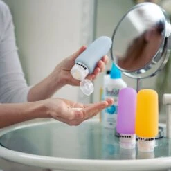 TRVLMORE Silicone Reisflesjes - Navulbaar - Handbagage - 100 ML - 3 Stuks - Oranje/Paars/Blauw -Winkel Voor Persoonlijke Verzorging 1200x1200 1153