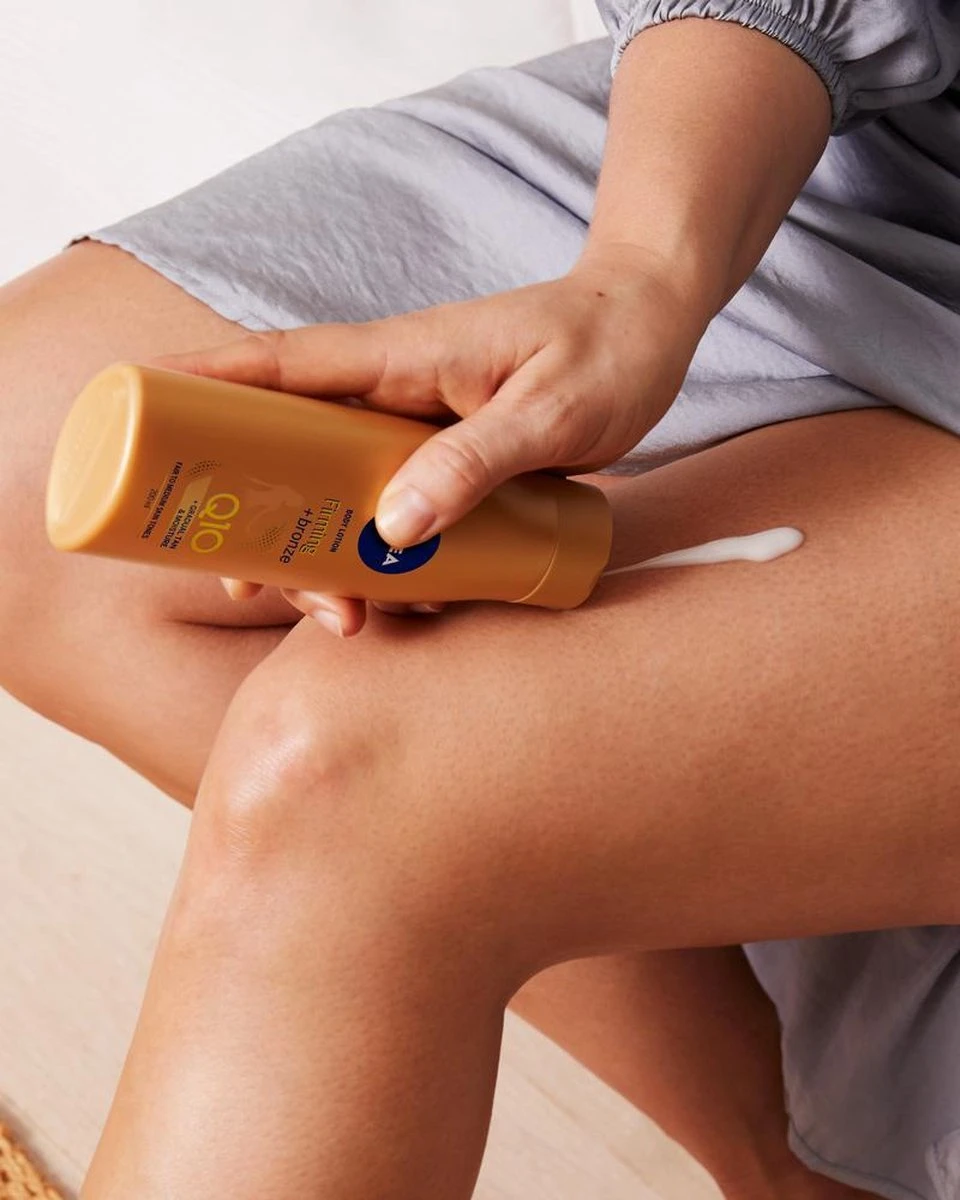 NIVEA Q10 Firming + Bronze Body Lotion - 400 Ml 4 NIVEA Q10 Firming + Bronze Body Lotion - 400 Ml - Afbeelding 2
