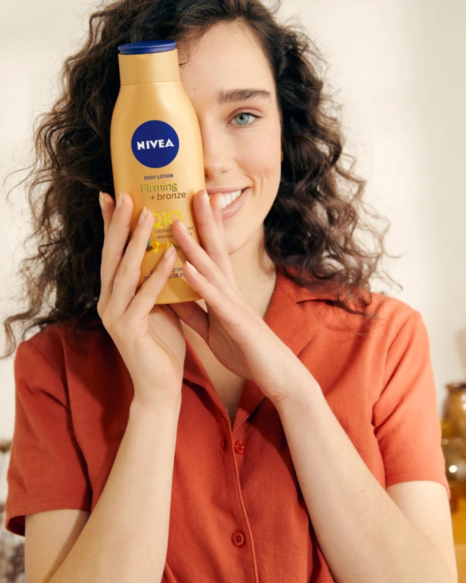 NIVEA Q10 Firming + Bronze Body Lotion - 400 Ml 10 NIVEA Q10 Firming + Bronze Body Lotion - 400 Ml - Afbeelding 8